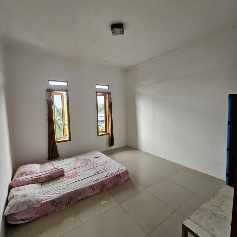 KOST BU NANI CIGOMBONG
